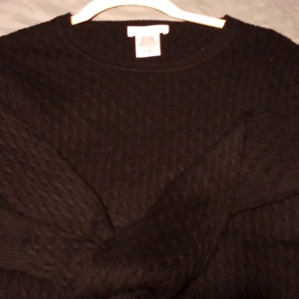 A black Kate Hill sweater